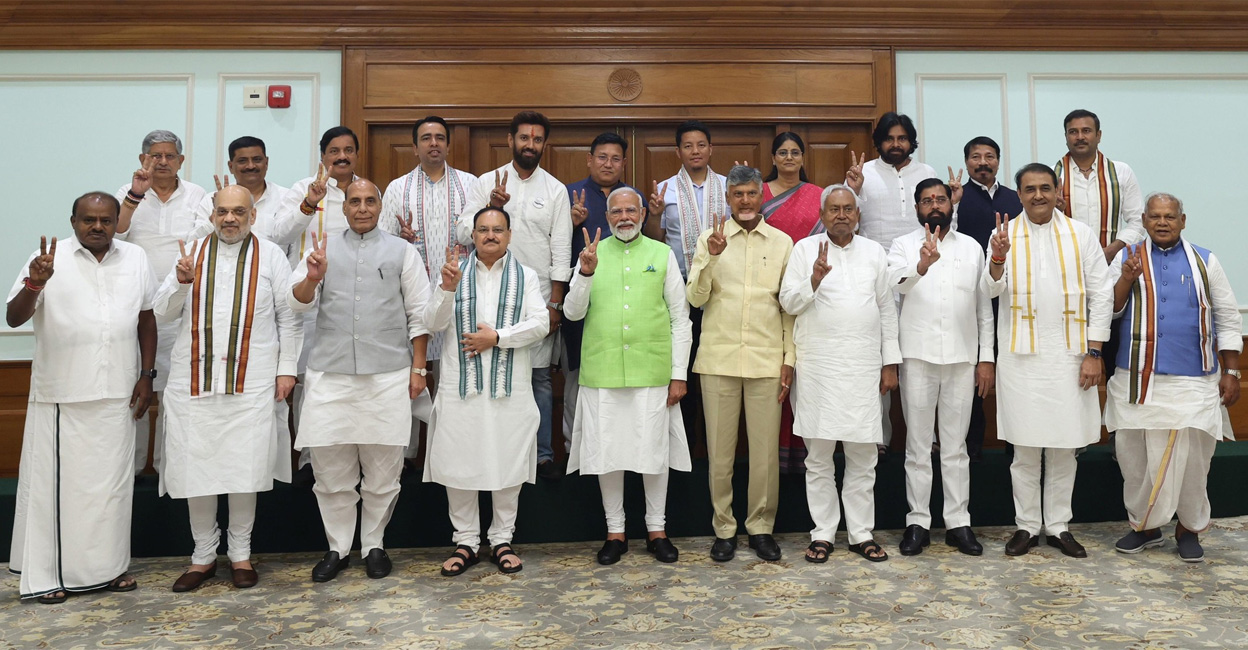 Narendra Modi and leaders of various parties in the NDA pose after a meeting at the prime minister's residence on Wednesday. Photo: Facebook/@BJP4India