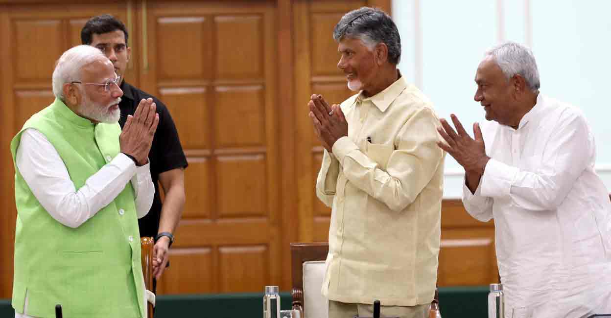 modi-nitish-kumar-chandrababu-naidu Prime Minister Narendra Modi with TDP chief N Chandrababu Naidu and JD(U) chief Nitish Kumar during National Democratic Alliance (NDA) meeting at PM's residence, in New Delhi, Wednesday, June 5, 2024. Photo: PTI
