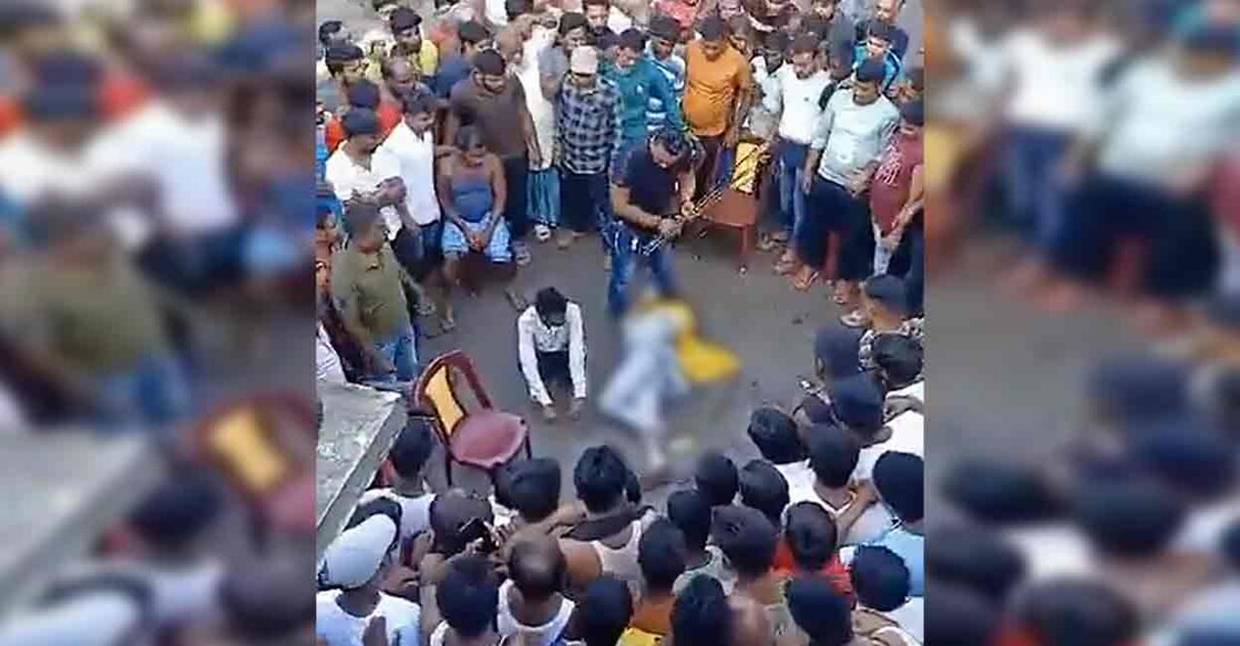 A couple allegedly engaged in an illicit relationship being assaulted by an alleged TMC leader Tajemul, nicknamed 'JCB', in North Dinajpur. Photo: PTI