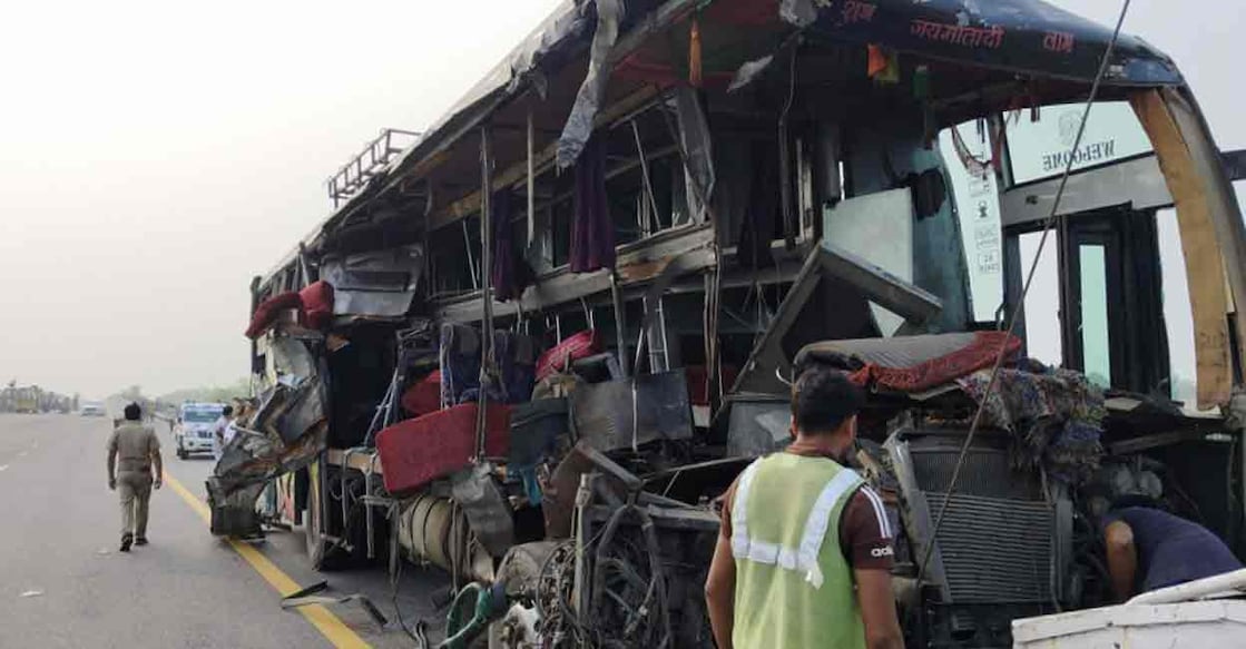 Mangled remains of a bus being towed after an accident, in Unnao district, Wednesday, July 10, 2024. Photo: PTI