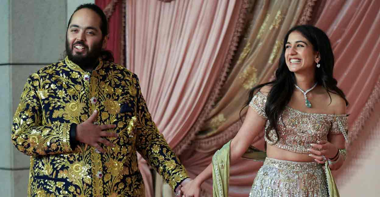 Anant Ambani, son of businessman Mukesh Ambani, arrives with his fiance Radhika Merchant on the red carpet during the sangeet ceremony at Jio World Centre, Mumbai, India, July 5, 2024. File photo: REUTERS/Hemanshi Kamani
