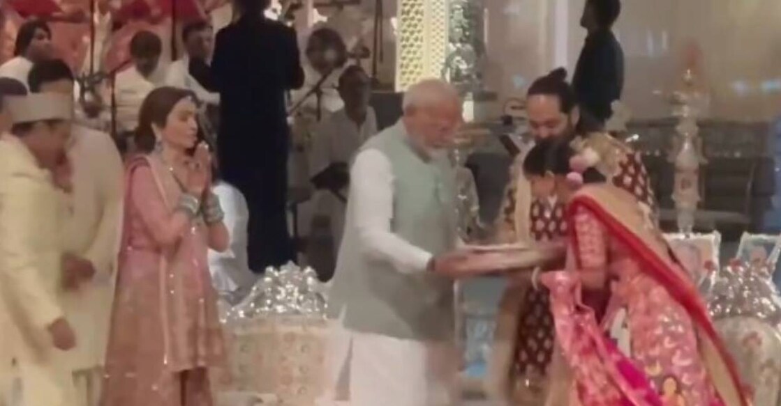 PM Modi blesses the couple. Photo: X/ rohanduaT02