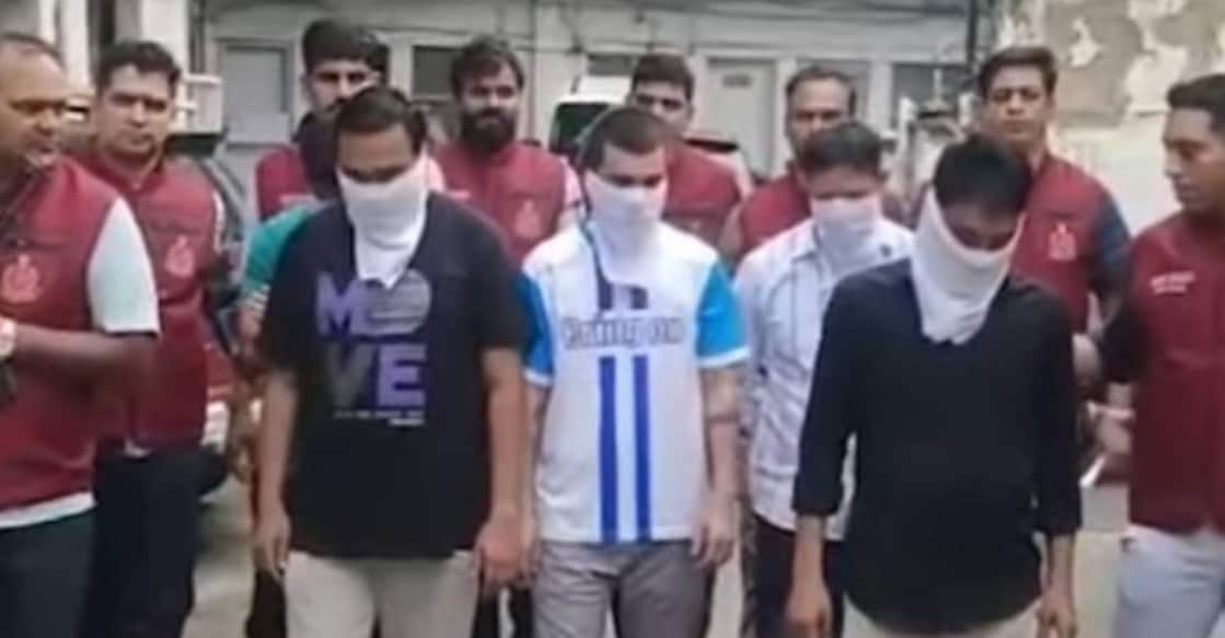 Delhi police with the organ trade racket members. Photo: Screengrab/ Manorama News
