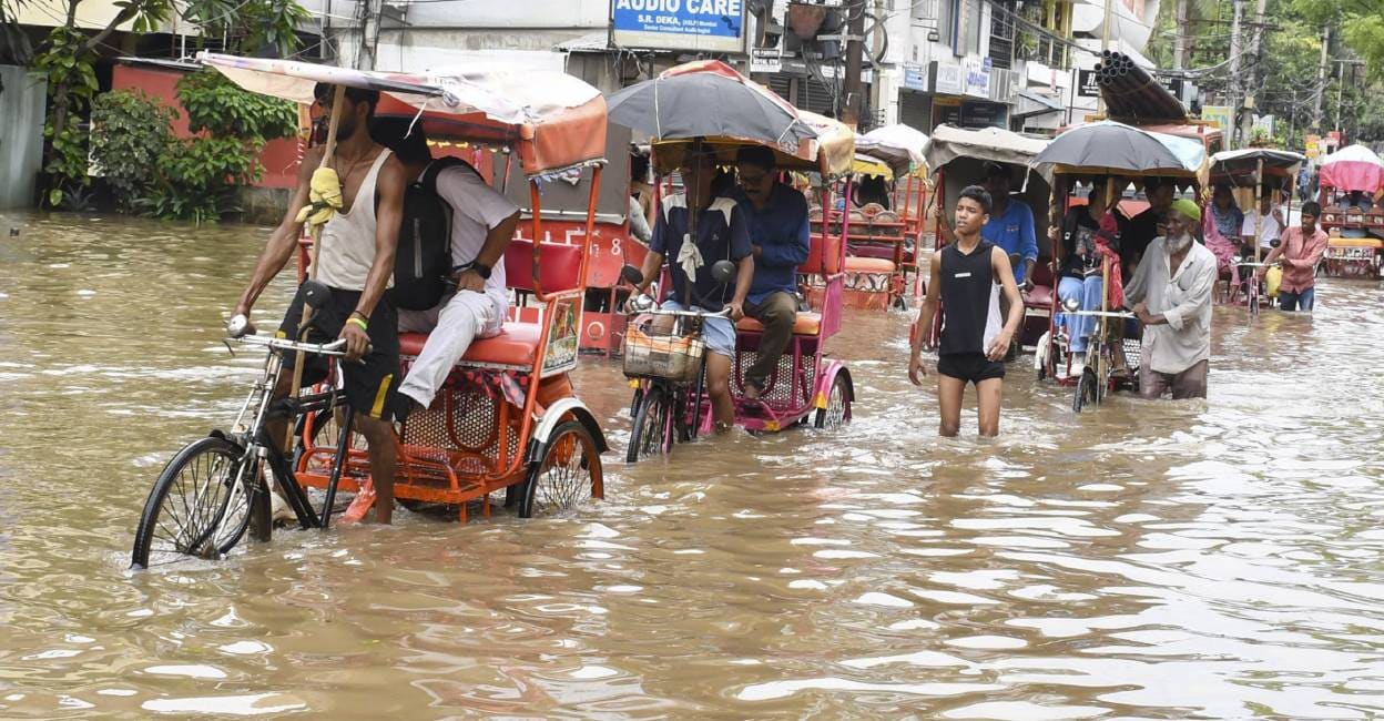 assam-flooded-road assam-flooded-road