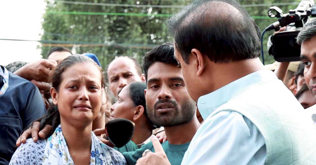 PTI07_06_2024_000291B Guwahati: Assam Chief Minister Himanta Biswa Sarma interacts with the parents of Abhinash, an eight-year-old boy who slipped from his father’s scooter on Thursday evening and fell into the open stormwater drain of Jyotinagar area, in Guwahati, Saturday, July 6, 2024. (PTI Photo) (PTI07_06_2024_000291B)