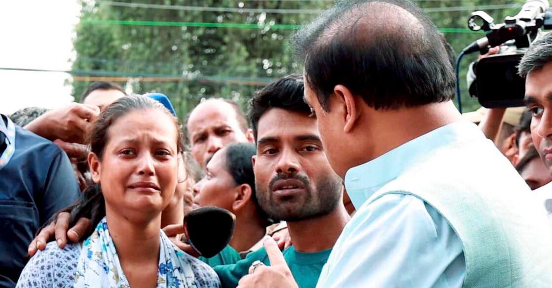 PTI07_06_2024_000291B Guwahati: Assam Chief Minister Himanta Biswa Sarma interacts with the parents of Abhinash, an eight-year-old boy who slipped from his father’s scooter on Thursday evening and fell into the open stormwater drain of Jyotinagar area, in Guwahati, Saturday, July 6, 2024. (PTI Photo) (PTI07_06_2024_000291B)