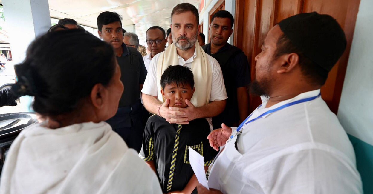 PTI07_08_2024_000245B Congress MP Rahul Gandhi meets people affected by the Manipur violence during his visit to a relief camp in Moirang on Monday. Photo: PTI
