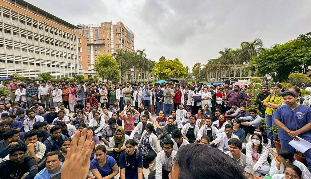Medics stage a protest against the sexual assault and murder of a postgraduate trainee doctor in Kolkata, at AIIMS, in New Delhi. Photo: PTI