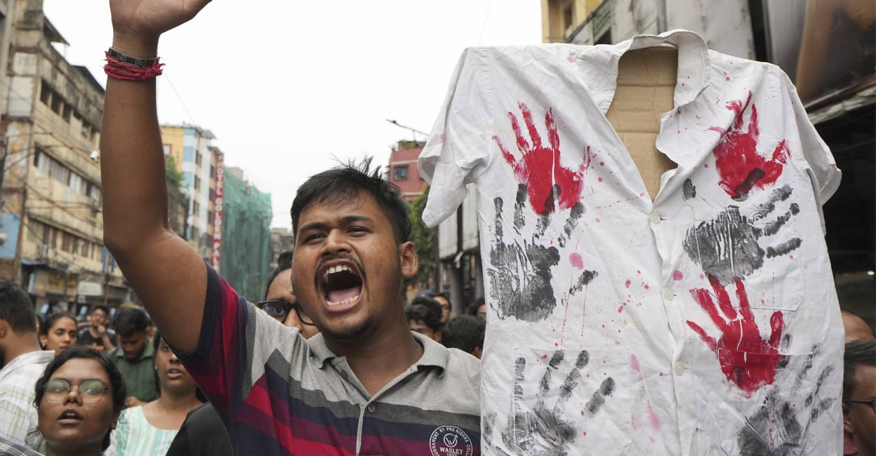 Junior doctors, trainee doctors and medical students during a protest against the sexual assault and killing of a post-graduate trainee doctor at RG Kar Medical College, in Kolkata, Monday, Aug. 12, 2024. Photo: PTI. 
