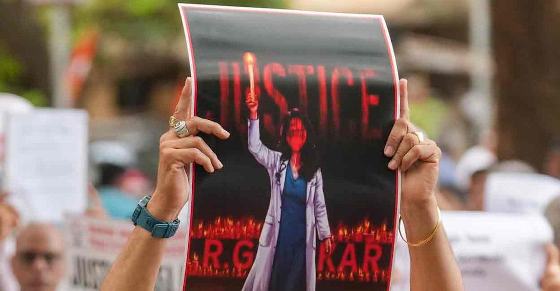 People stage a protest against the alleged rape and murder of a trainee doctor at Kolkata's RG Kar Medical College and Hospital, in Mumbai, Sunday, Aug. 18, 2024. Photo: PTI
