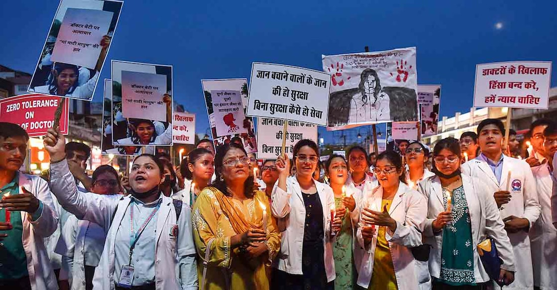 PTI08_17_2024_000214B Doctors protest during a rally against the alleged rape and murder of a trainee doctor at the RG Kar Medical College and Hospital. Photo: PTI