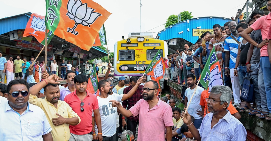 bjp protest BJP workers and supporters block railway tracks at Shantipur station during the party's 12-hour general strike in Benga. Photo: PTI