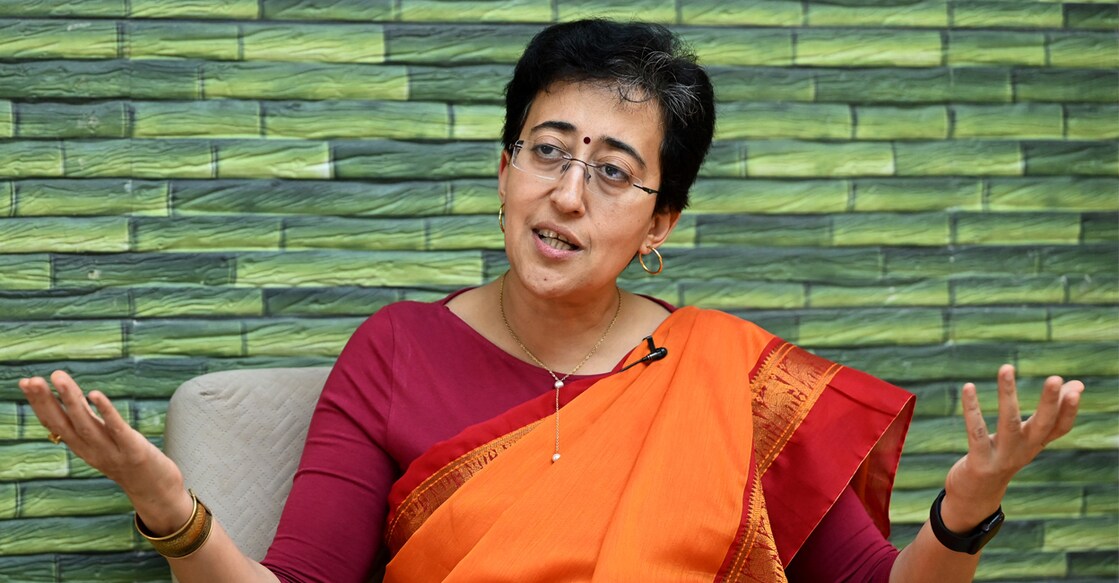 Atishi currently holds the most number of portfolios in the Delhi Cabinet. Photo: AFP/SAJJAD HUSSAIN