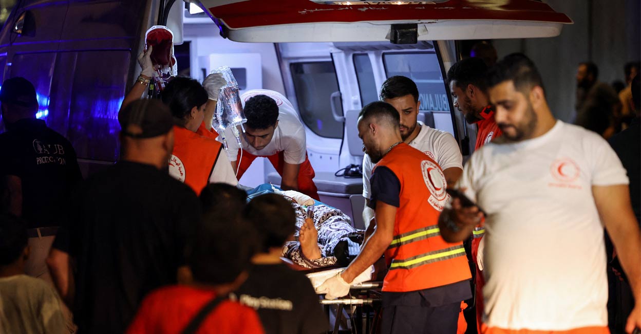 A person is carried on a stretcher outside American University of Beirut Medical Center (AUBMC) as people, including Hezbollah fighters and medics, were wounded and killed when the pagers they use to communicate exploded across Lebanon, according to a security source, in Beirut, Lebanon September 17, 2024. Photo: Reuters. 