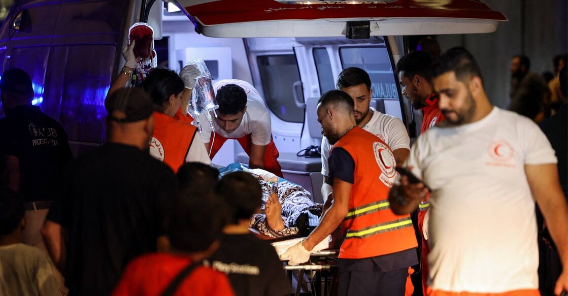 A person is carried on a stretcher outside American University of Beirut Medical Center (AUBMC) as people, including Hezbollah fighters and medics, were wounded and killed when the pagers they use to communicate exploded across Lebanon, according to a security source, in Beirut, Lebanon September 17, 2024. Photo: Reuters. 