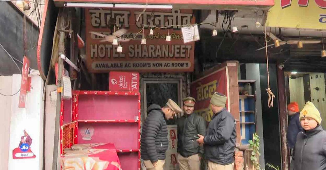 Police personnel during an investigation after five members of a family were found dead inside a hotel, in Lucknow, Wednesday, Jan. 1, 2025. Photo: PTI