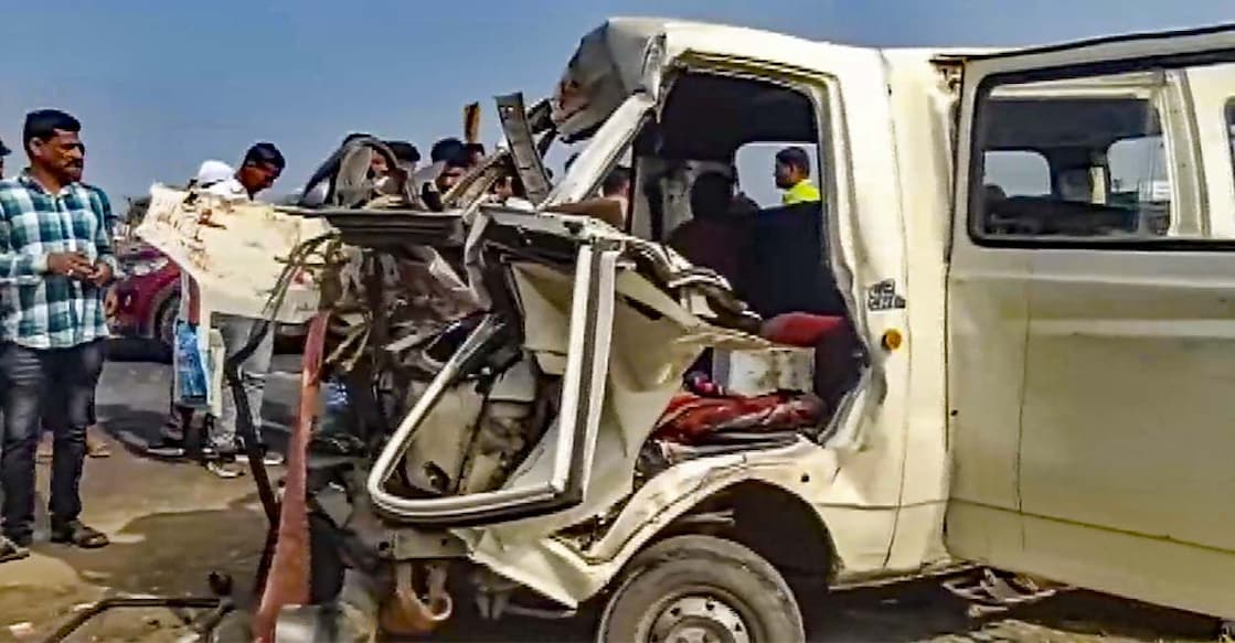 People gather near the accident site on the Pune-Nashik Highway on Friday. Photo: PTI