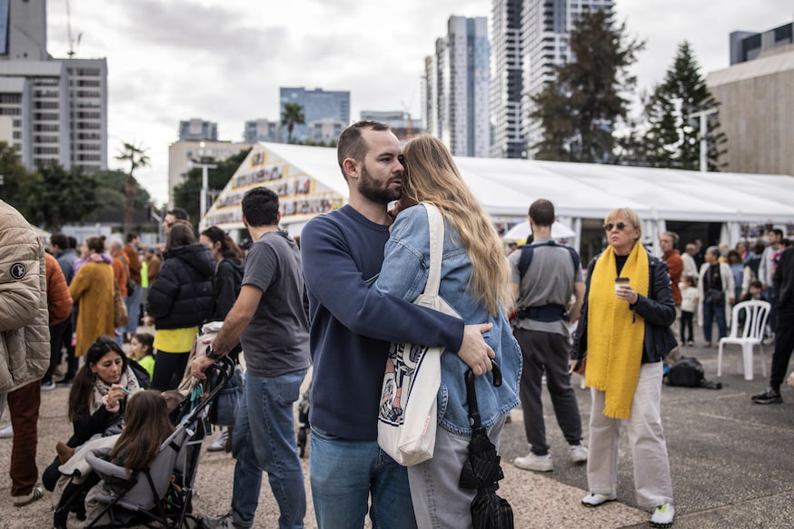 Relatives and friends of Israeli hostages held by Hamas militants in the Gaza Strip react as they watch the release of four women soldiers. Photo: John Wessels/AFP