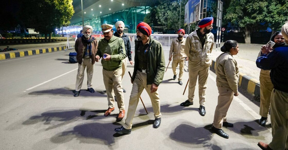 Security personnel outside the airport ahead of the second batch of the immigrants' arrival from the US, in Amritsar, Saturday, Feb. 15, 2025. Photo: PTI. 