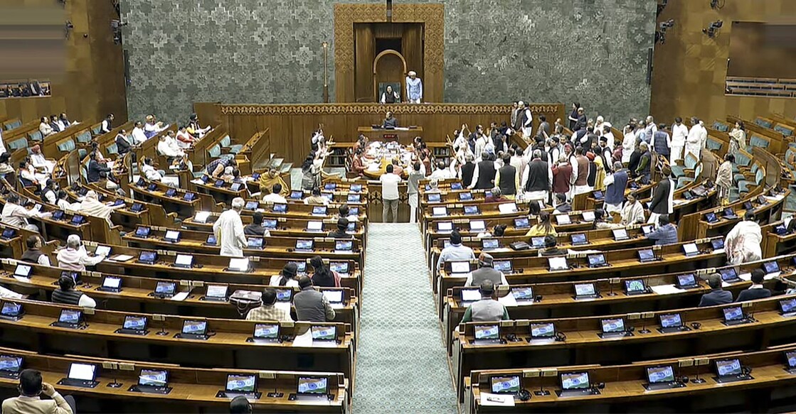 Opposition MPs protest in the Lok Sabha during the Budget session of Parliament, in New Delhi, Thursday, Feb. 6, 2025. Photo: PTI. 