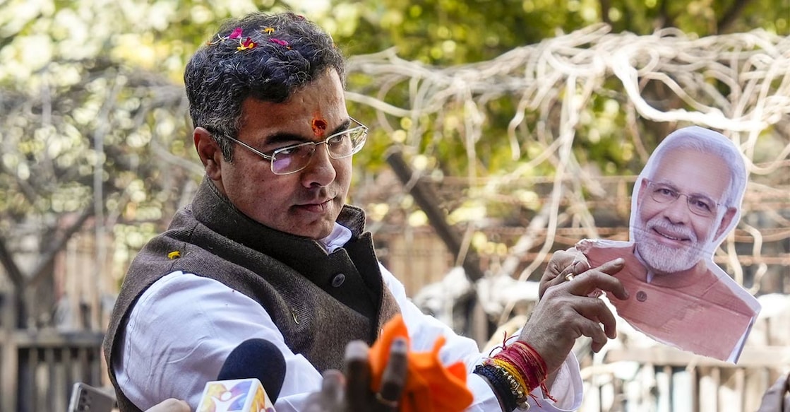 Bharatiya Janata Party (BJP) leader Parvesh Verma flashes victory sign as he arrives at the party's headquarters to celebrate the their win in the Delhi legislative assembly election in New Delhi on February 8, 2025. Photo: AFP via PTI. 