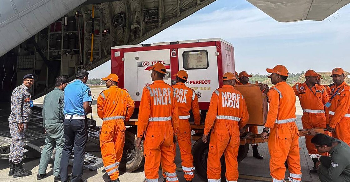National Disaster Response Force (NDRF) personnel loading relief materials in an Indian Air Force (IAF) aircraft following an earthquake in Myanmar, at the Hindon Airbase station in Ghaziabad. Photo: AFP