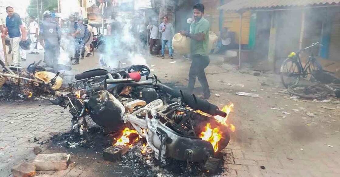 **EDS: RPT WITH ADDED POST PRODUCTION** South 24 Parganas: Police vehicles set on fire allegedly by members of Indian Secular Front (ISF) during a protest march to Kolkata over Waqf (Amendment) Act, at Bhangar in South 24 Parganas district, West Bengal, Monday, April 14, 2025. (PTI Photo)(PTI04_14_2025_RPT312B)