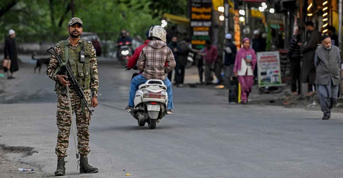 An Indian paramilitary personnel stands guard near Pahalgam, south of Srinagar, on April 22, 2025, following an attack. Photo: AFP