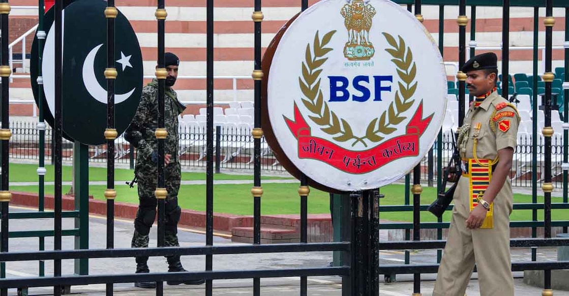 PTI04_23_2025_000625B In this Sunday, July 14, 2019 file image, BSF and Pakistani Rangers soliders stand guard at Attari-Wagah international border. Photo: PTI
