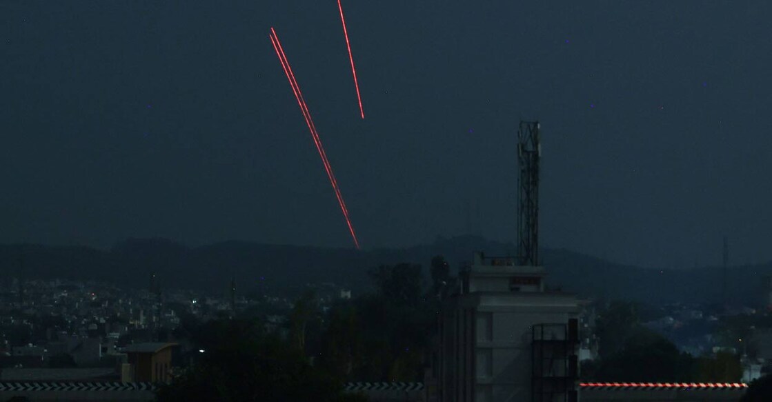 Trails from an Indian air defence system are seen above Jammu during a Pakistani strike on May 9, 2025. Photo: AFP via PTI. 