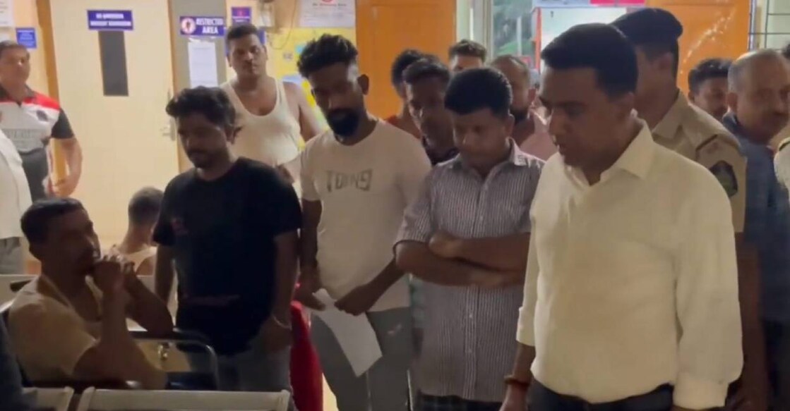 goa-cm-visits-patients In this screenshot from a video provided by CMO, Goa Chief Minister Pramod Sawant visits a hospital where injured being treated after a stampede in which at least seven people were killed and over 30 injured during the Shri Lairai Zatra. Photo: PTI