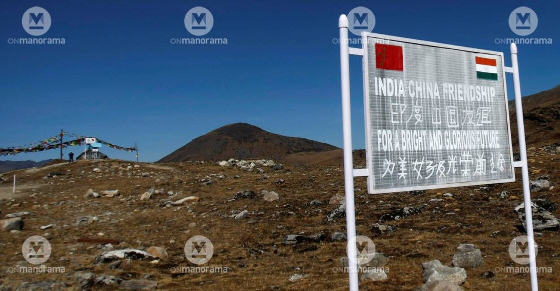 A signboard on the India-China border. Photo: PTI/ Manorama Archives