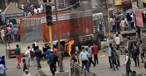 Army called in as violence hits Haryana, curfew in 2 districts