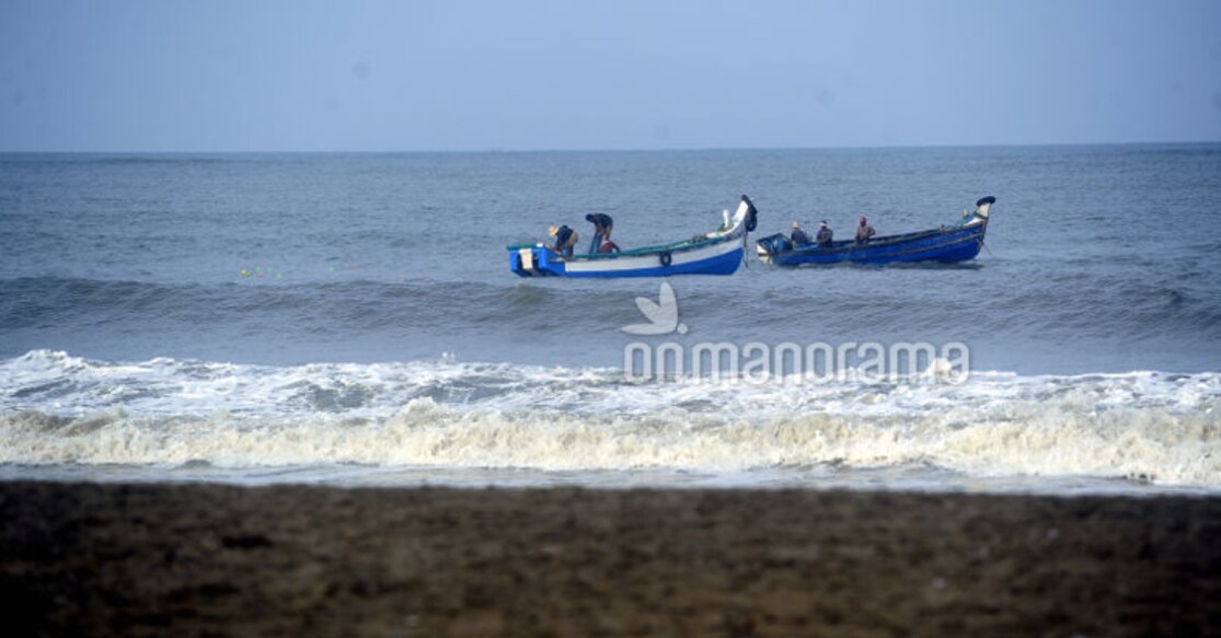 Fishermen at Kozhikode beach. 
