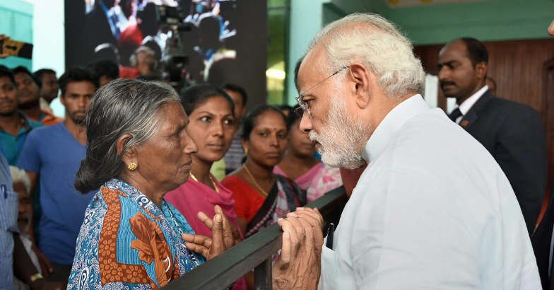 PM Modi visits Ockhi-hit Poonthura, promises all help | Modi in Kerala ...