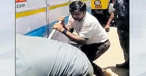 CMD Rajamanickam pulls over to change flattened tyre of a KSRTC bus 