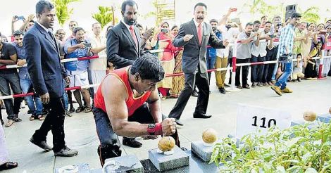 Kerala youth crushes record 124 coconuts in a minute with bare hands