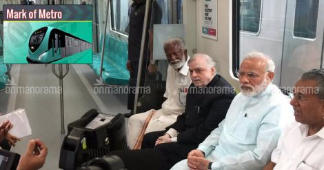 Prime minister keenly followed by trollers on Kochi Metro