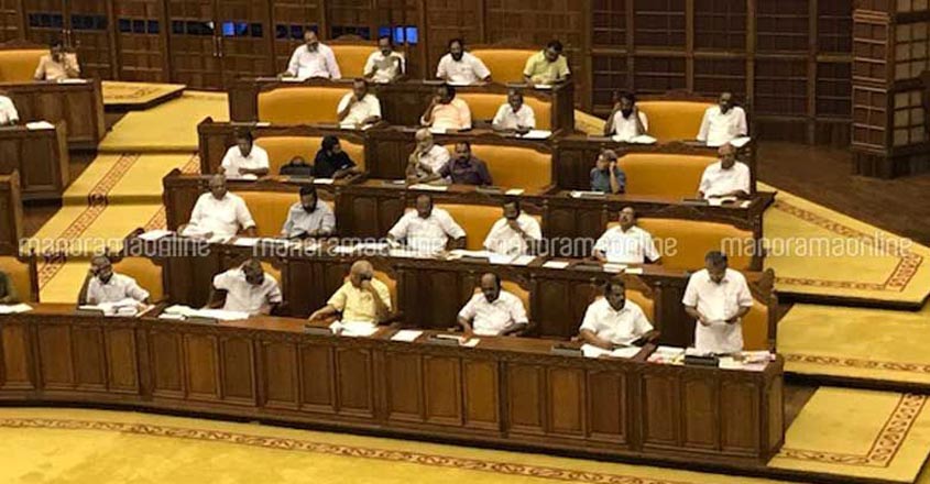 Opposition blames Isaac for smothering local bodies, walks out of Assembly Opposition blames Isaac for smothering local bodies, walks out of Assembly