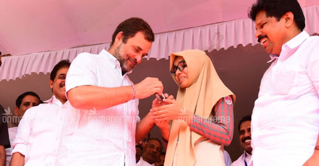 Rahul Gandhi gives chocolates to his speech translator Safa Fabin, a Class 12 student of Government Higher Secondary School at Karuvarakkundu in Malappuram district. Photo - Sameer A Hameed