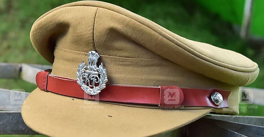 kerala police cap emblem