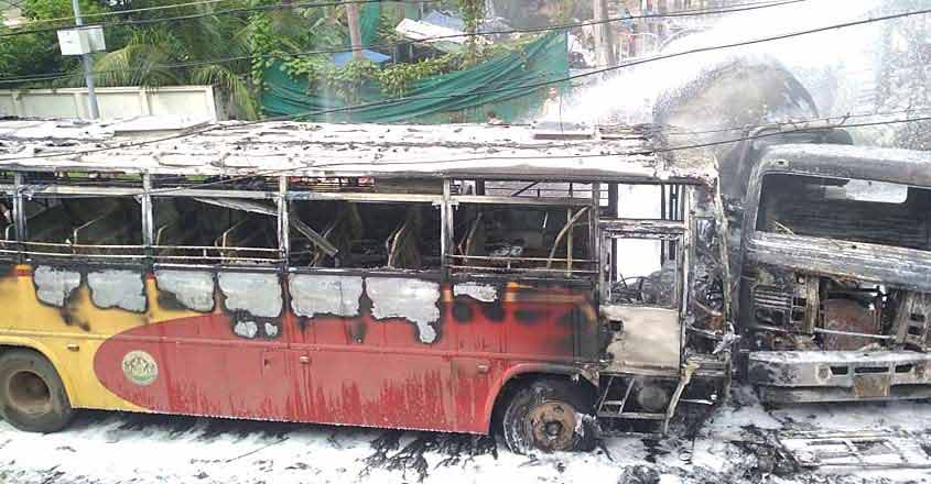 KSRTC bus catches fire after collision with lorry in Kollam KSRTC bus catches fire after collision with lorry in Kollam