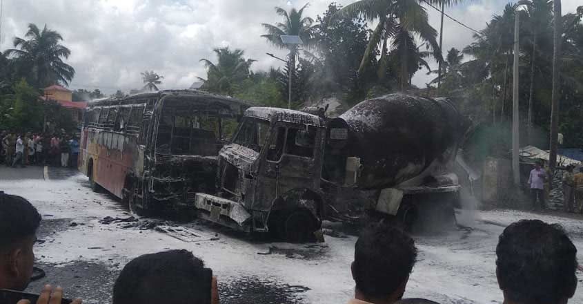 KSRTC bus catches fire after collision with lorry in Kollam KSRTC bus catches fire after collision with lorry in Kollam