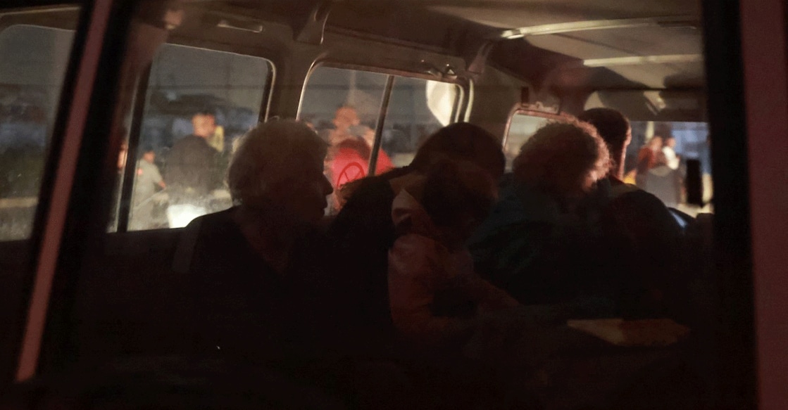 An International Red Cross vehicle reportedly carrying Israeli hostages released by Hamas crosses the Rafah border point in the Gaza Strip towards Egypt from where they would be flown to Israel to be reunited with their families, on November 24, 2023. Photo: AFP/ Mohammed Abed