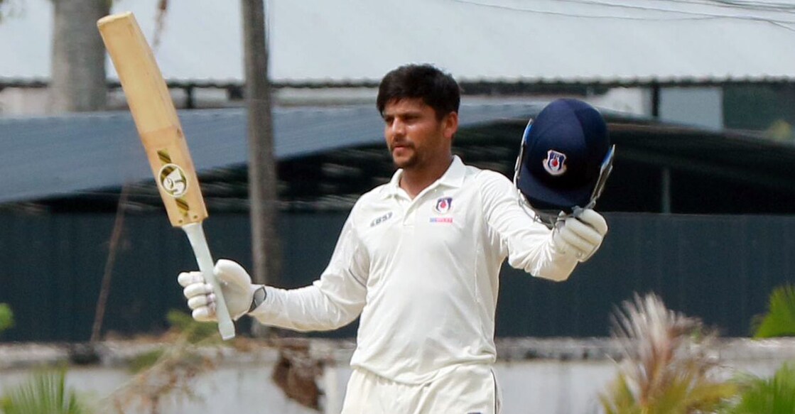 Priyam Garg celebrates his century for Uttar Pradesh against Kerala on the final day of their Ranji Trophy match in Alappuzha on Monday. Photo: KCA