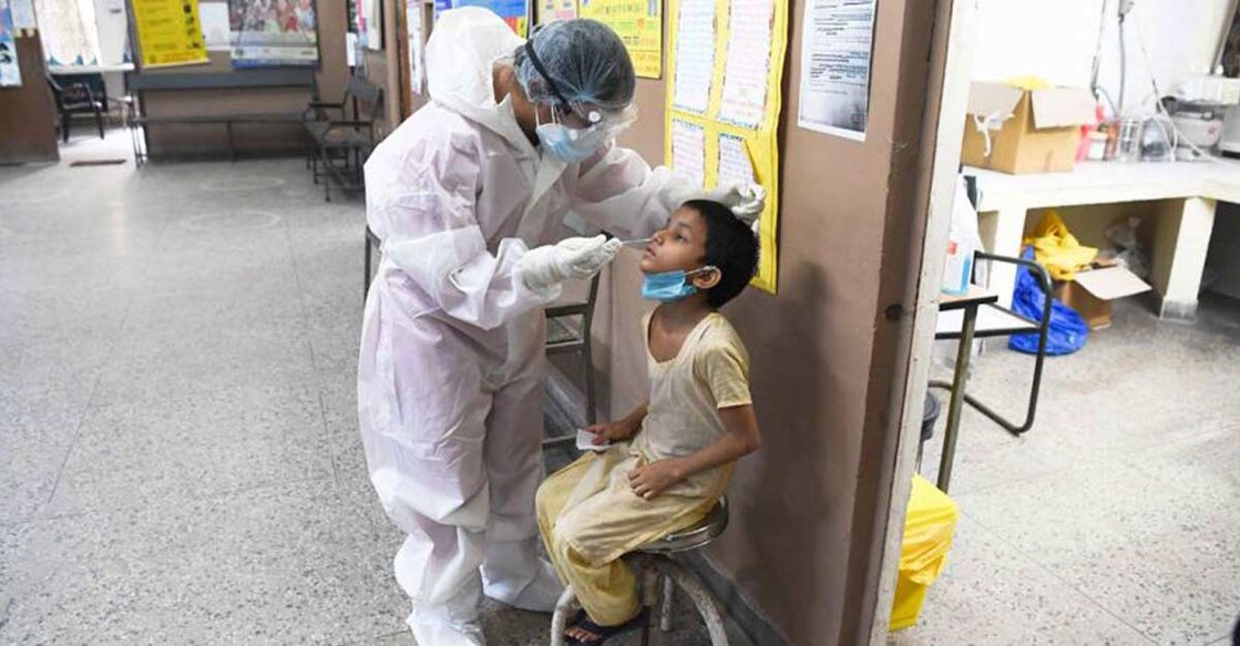 As COVID cases surge, Kerala revises testing guidelines