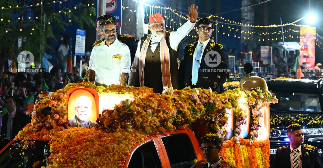 bjp-roadshow-modi-kochi Prime Minister Narendra Modi with BJP Keralam president K Surendran during a roadshow in Kochi on Tuesday. Photo: Tony Dominic/Manorama