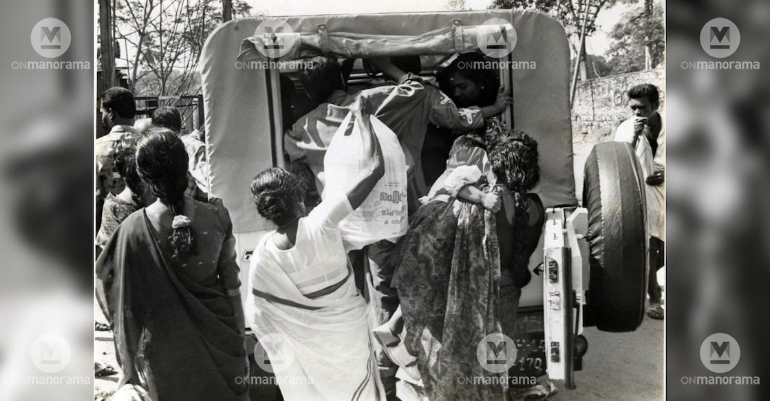 A family with an infant trying to enter an already crowded jeep somewhere in Kerala. File photo: Manorama