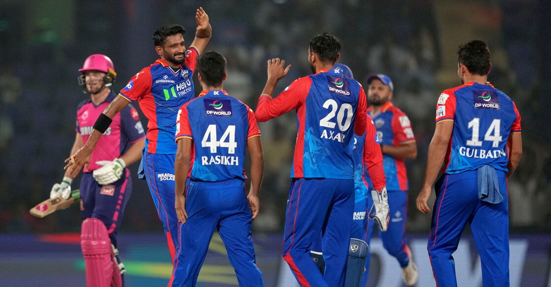 Delhi Capitals bowler Axar Patel celebrates the wicket of Rajasthan Royals batter Jos Buttler during the Indian Premier League (IPL) match in New Delhi on Tuesday. Photo: PTI