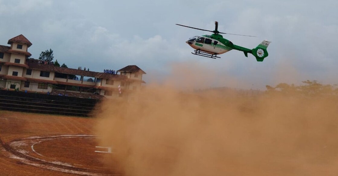 Untitled design - 1 A helicopter, to be flown to Kambamala for surveillance operations, landing at Mananthavadi, Wayanad on Monday. Photo: Special arrangement